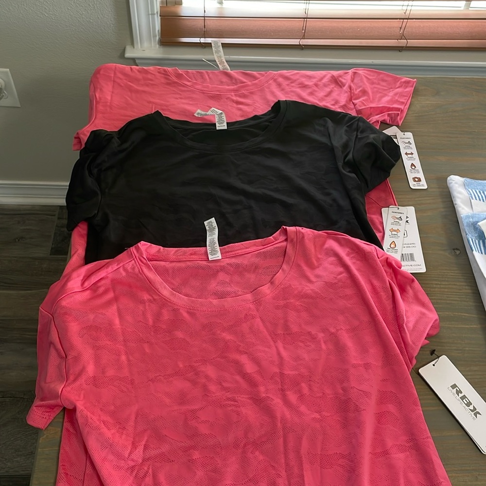 3 NEW RBX Wicking Shirts- 2 pink and 1 black!   New with tags!!